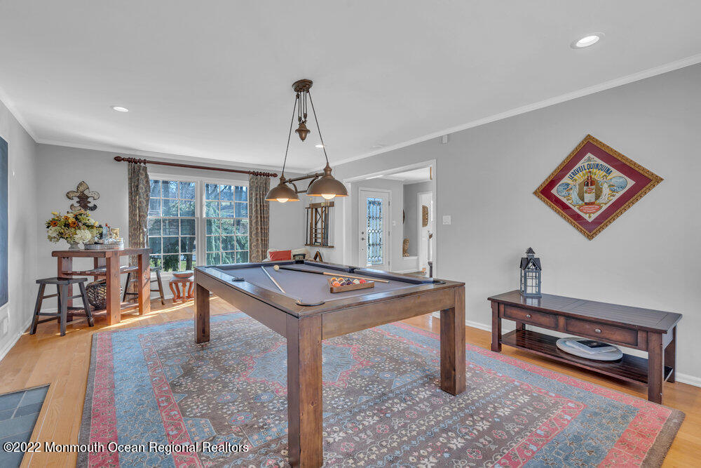 409 Dwight Road Middletown, NJ 07748 - Photo 8 of 53 a room with furniture pool table and windows