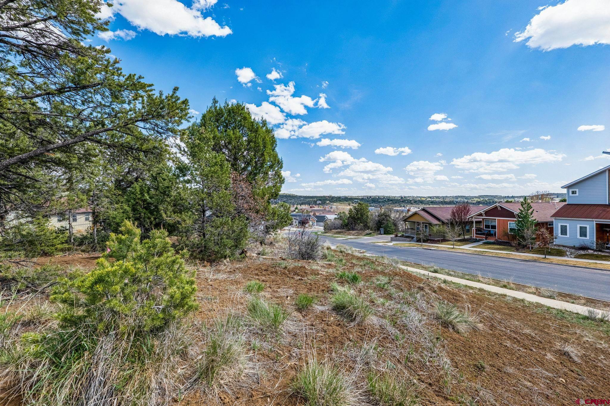 7 Salt Brush Street Durango, CO 81301 - Photo 12 of 18 a view of a house with a yard