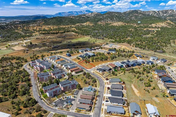 a view of a city with an ocean