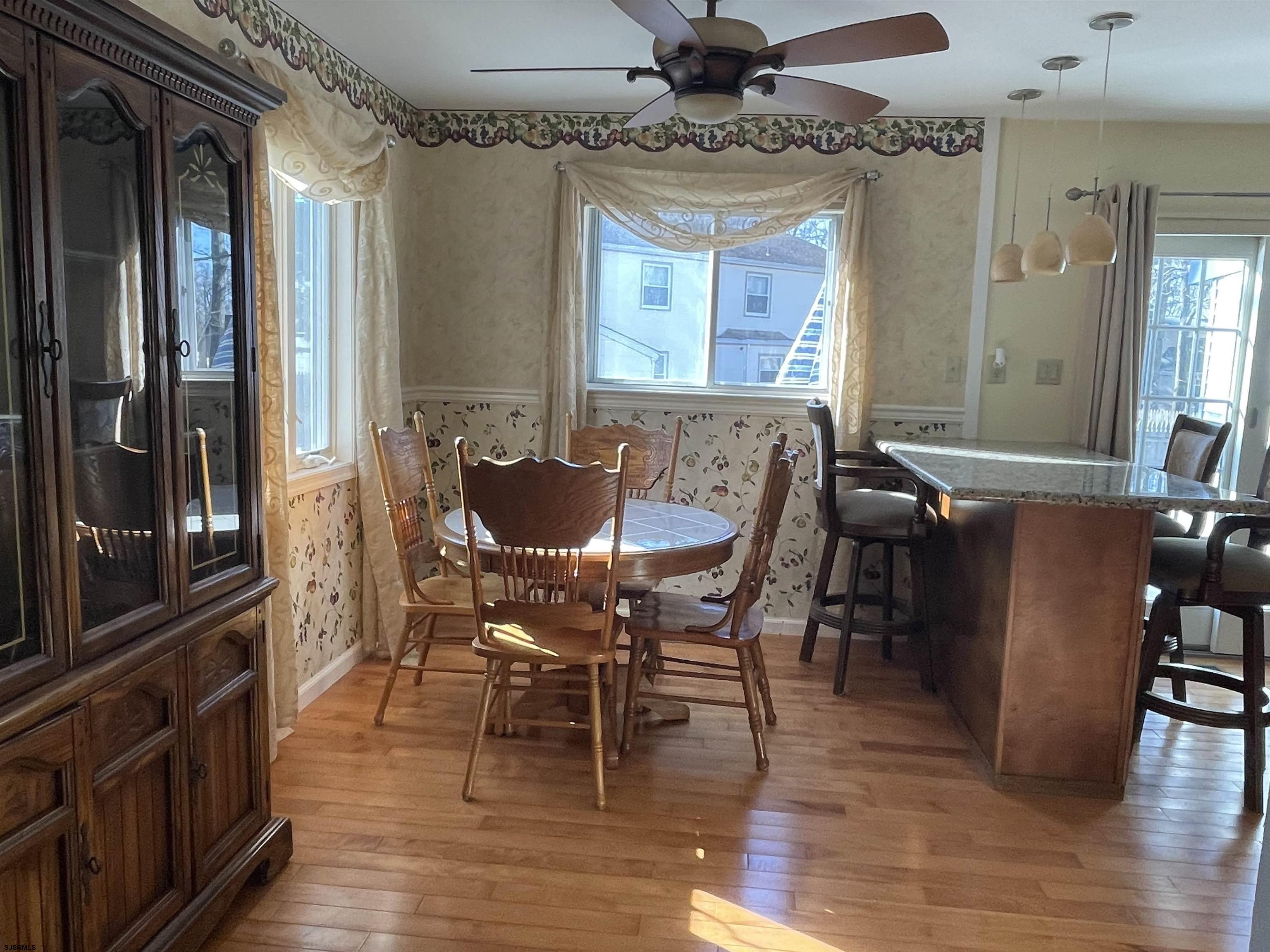 401 Mill Road Absecon, NJ 08201 - Photo 8 of 35 Not a fan of formal dining, leave it as it is.Or if you want a larger table, just relocate the Islan