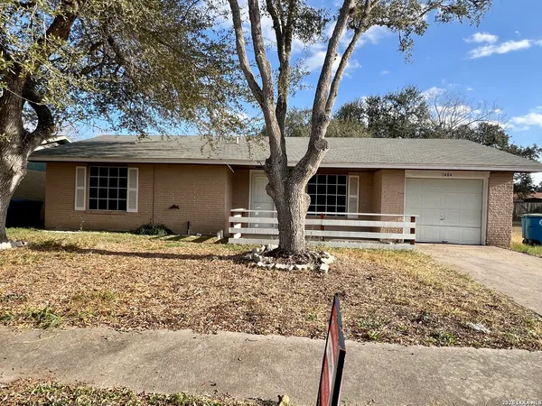 a house with trees in the background