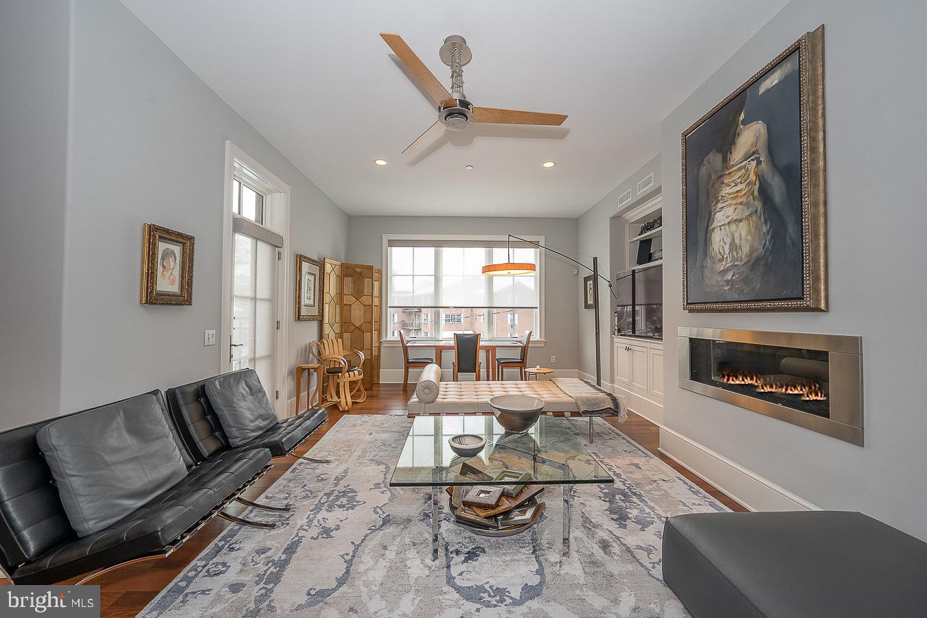 100 St Georges Road, Unit A3 Ardmore, PA 19003 - Photo 18 of 43 a living room with furniture and a fireplace