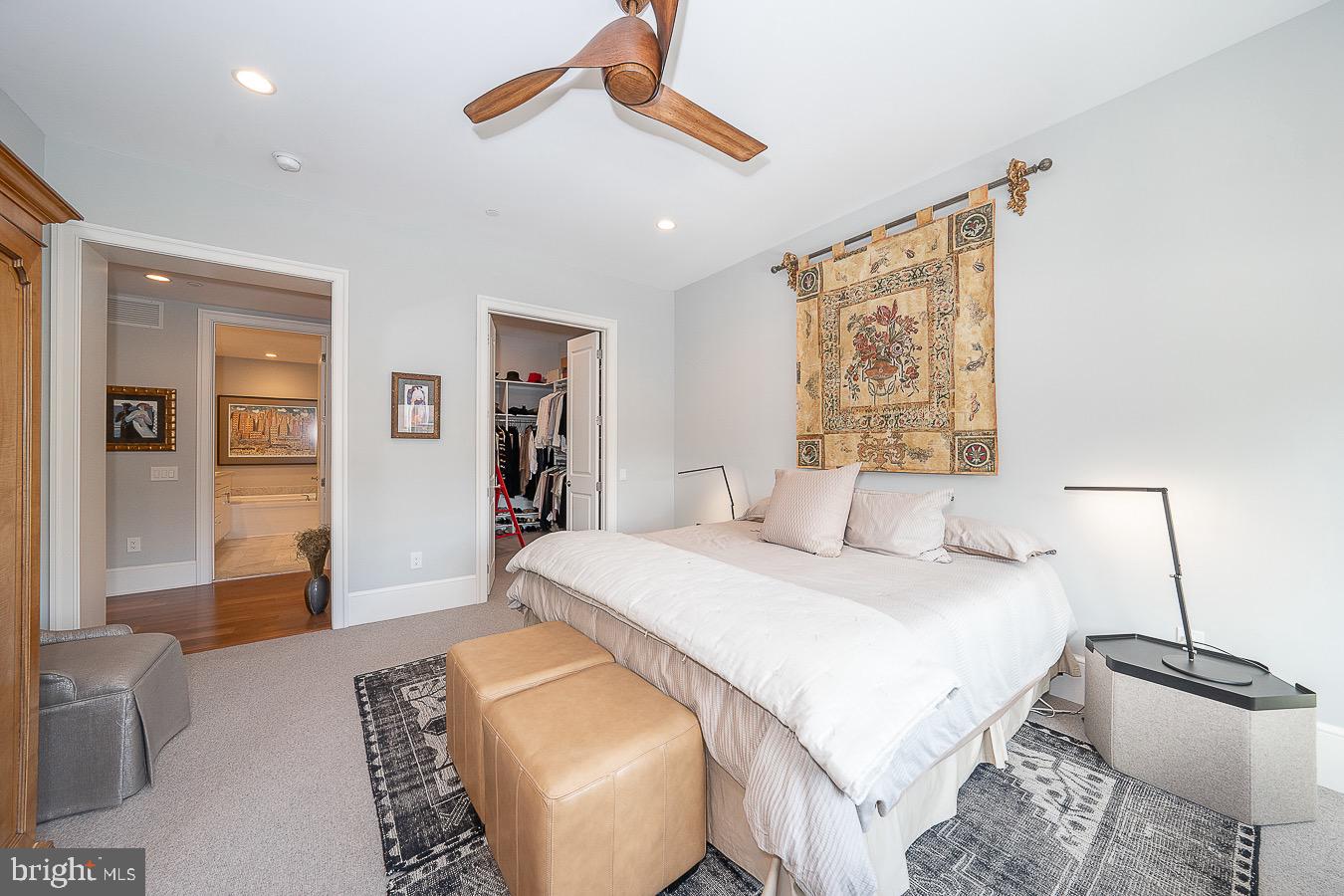 100 St Georges Road, Unit A3 Ardmore, PA 19003 - Photo 21 of 43 a bedroom with a bed and a chandelier