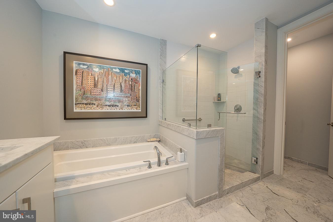 100 St Georges Road, Unit A3 Ardmore, PA 19003 - Photo 23 of 43 a bathroom with a bathtub and a sink