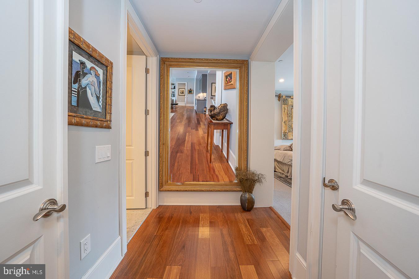 100 St Georges Road, Unit A3 Ardmore, PA 19003 - Photo 25 of 43 a view of a bedroom with wooden floor and bathroom