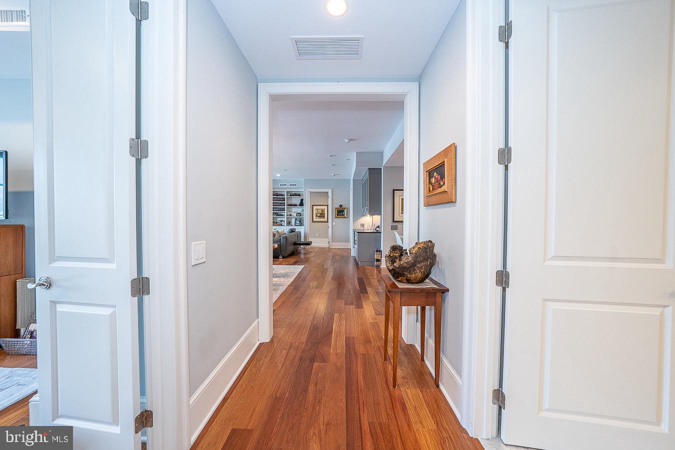 100 St Georges Road, Unit A3 Ardmore, PA 19003 - Photo 26 of 43 a view of a hallway view with wooden floor and staircase