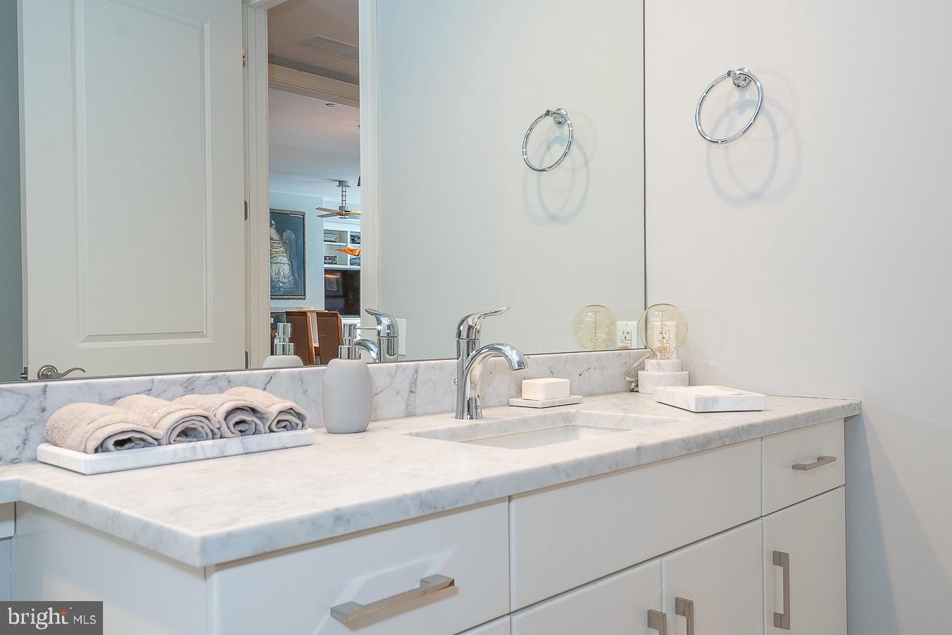 100 St Georges Road, Unit A3 Ardmore, PA 19003 - Photo 32 of 43 a bathroom with a sink and a mirror