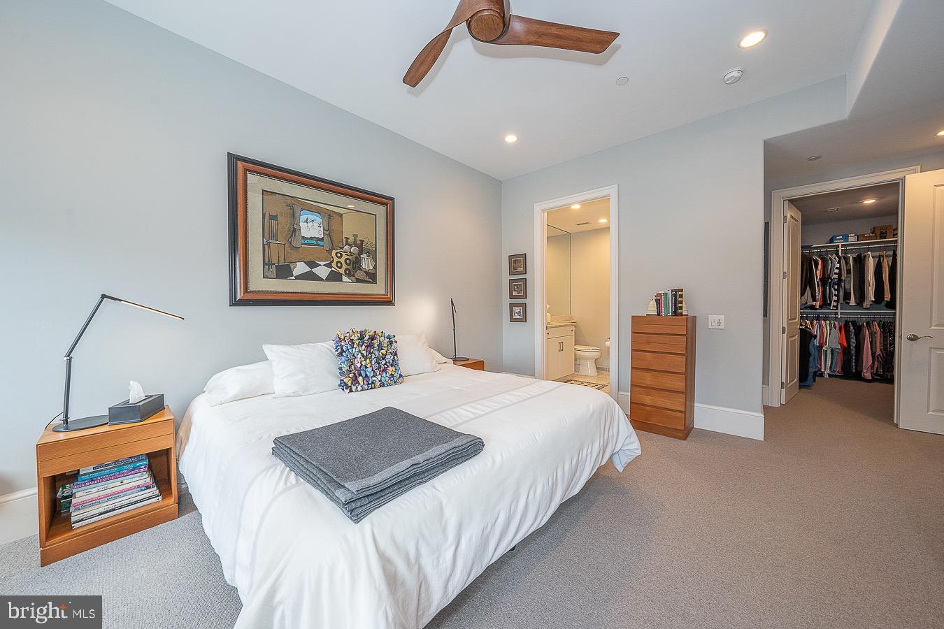 100 St Georges Road, Unit A3 Ardmore, PA 19003 - Photo 34 of 43 a bedroom with a bed and a lamp