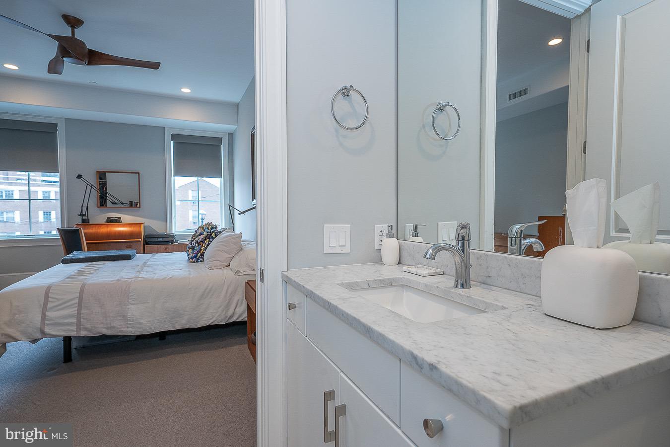 100 St Georges Road, Unit A3 Ardmore, PA 19003 - Photo 35 of 43 a en suite bathroom with a double vanity sink and mirror