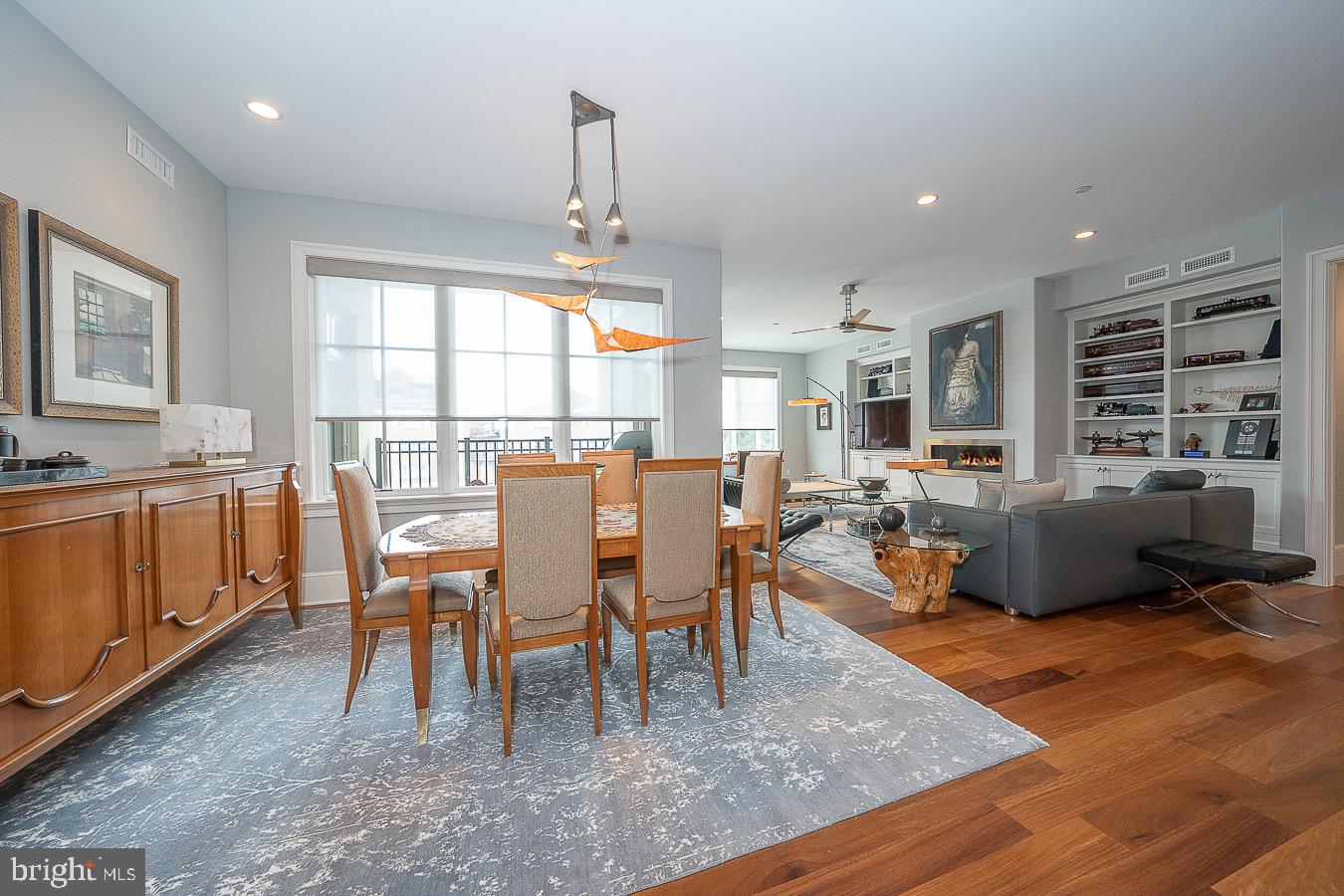 100 St Georges Road, Unit A3 Ardmore, PA 19003 - Photo 6 of 43 a living room with furniture a large window and a table