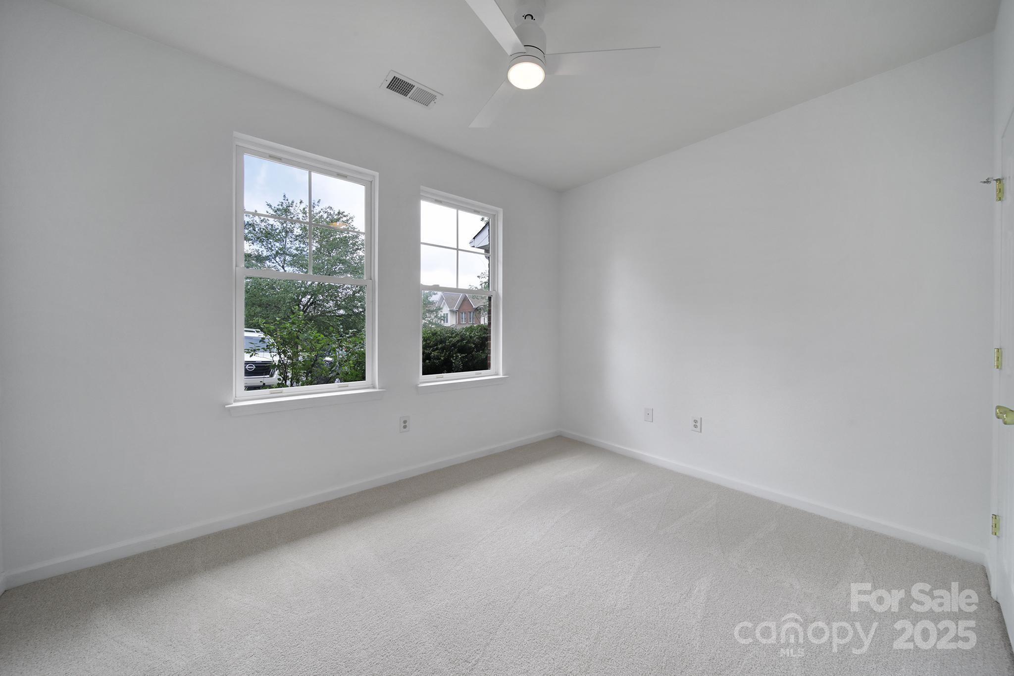 614 Stone Village Drive Fort Mill, SC 29708 - Photo 20 of 42 an empty room with a window