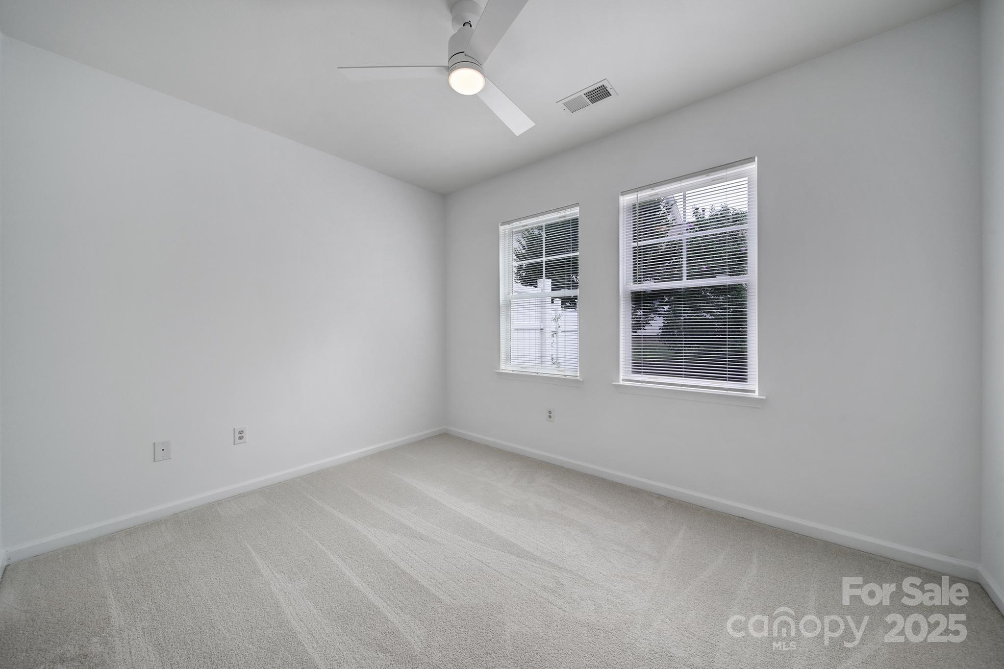 614 Stone Village Drive Fort Mill, SC 29708 - Photo 25 of 42 an empty room with windows
