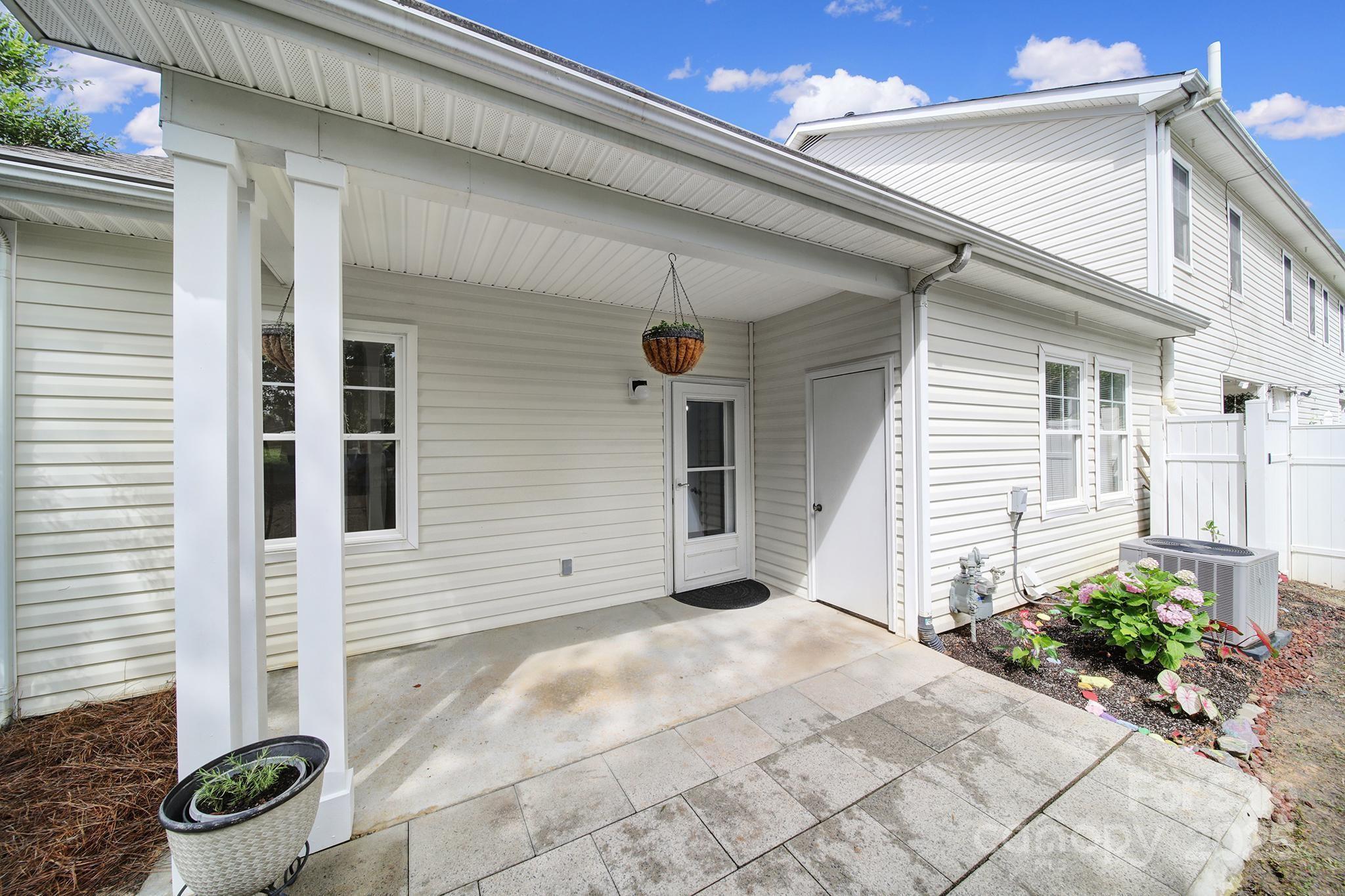 614 Stone Village Drive Fort Mill, SC 29708 - Photo 30 of 42 a front view of a house with a porch