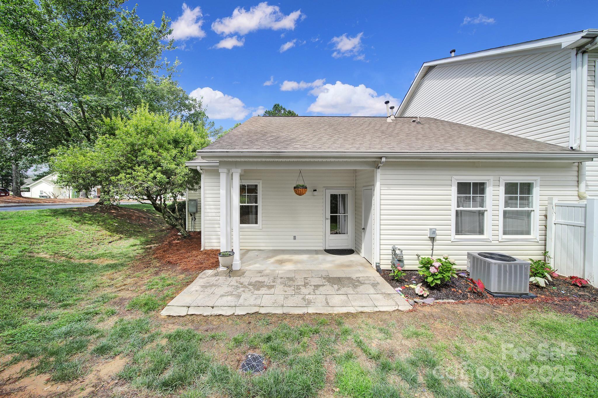614 Stone Village Drive Fort Mill, SC 29708 - Photo 31 of 42 a front view of a house with garden