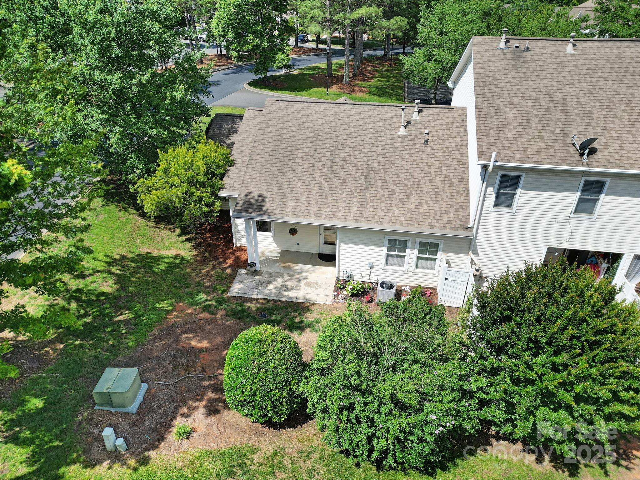 614 Stone Village Drive Fort Mill, SC 29708 - Photo 34 of 42 an aerial view of a house with yard swimming pool and outdoor seating
