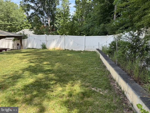6603 Huntsman Boulevard Springfield, VA 22152 - Photo 55 of 64 Lush green yard with serene privacy.