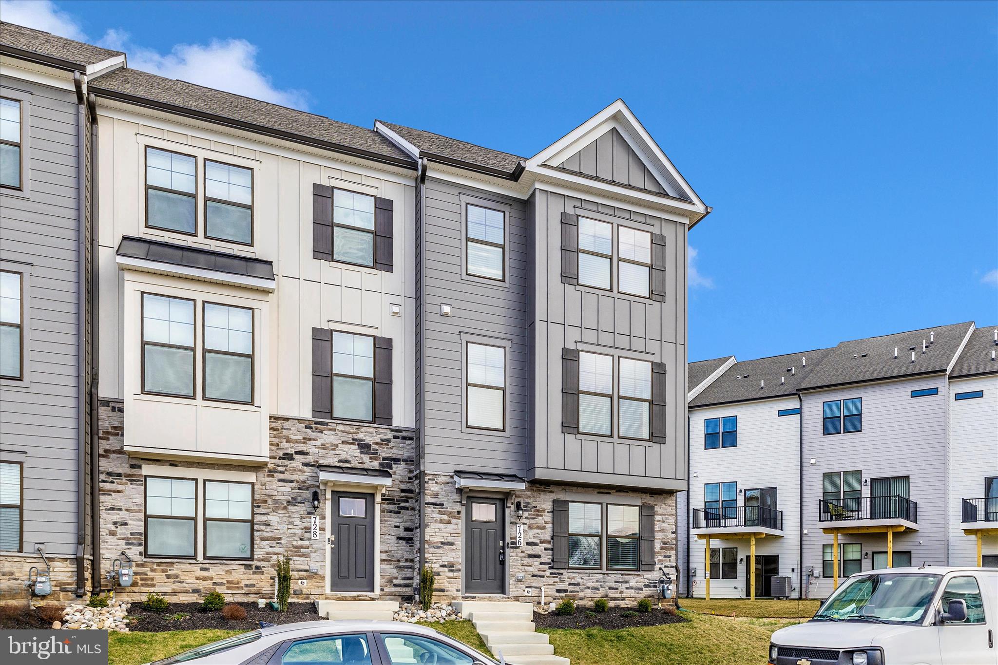 726 Compass Way Frederick, MD 21701 - Photo 3 of 55 a front view of a building with street view