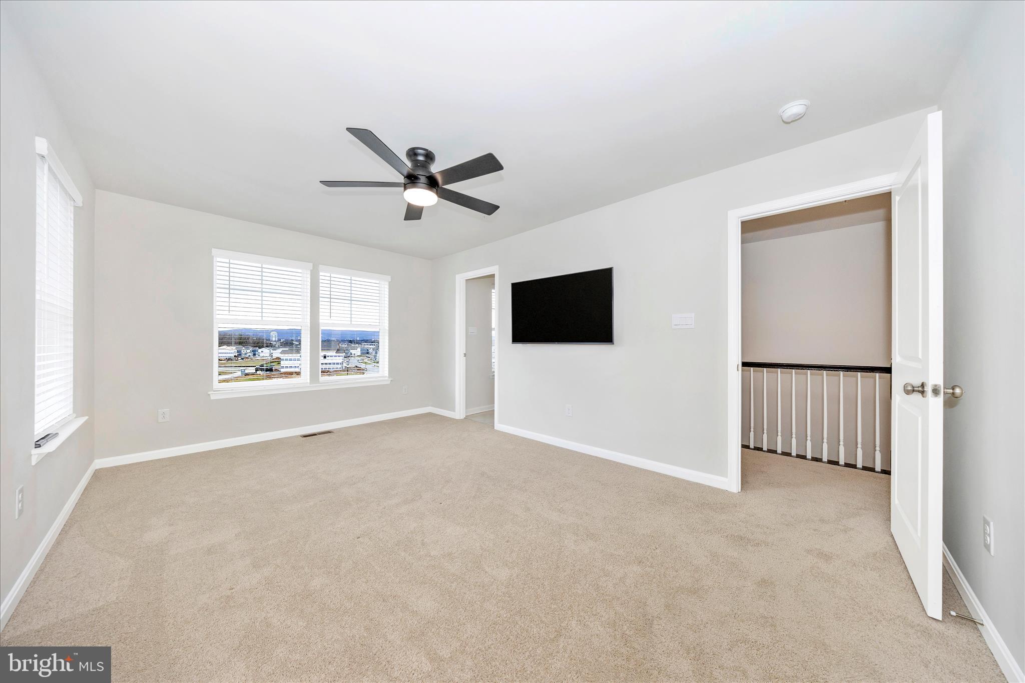 726 Compass Way Frederick, MD 21701 - Photo 35 of 55 a view of an empty room with a window