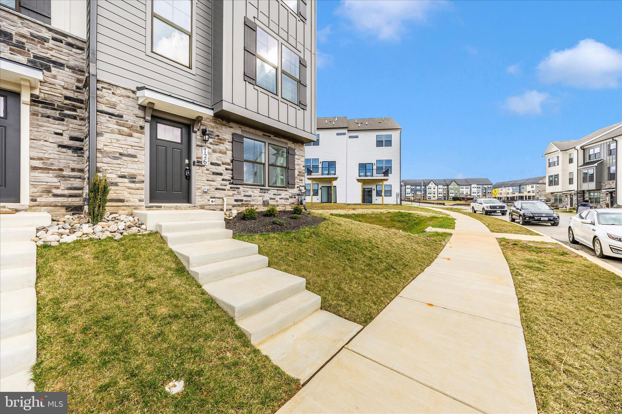 726 Compass Way Frederick, MD 21701 - Photo 49 of 55 a view of a swimming pool with outdoor seating