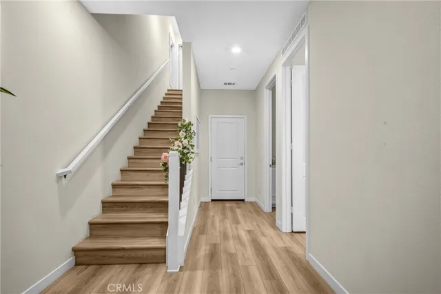 a bedroom with bed and a window