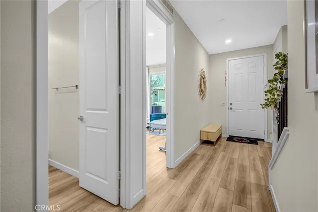 a view of a brick house with many windows
