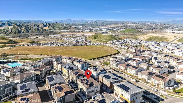 an aerial view of residential building and lake view