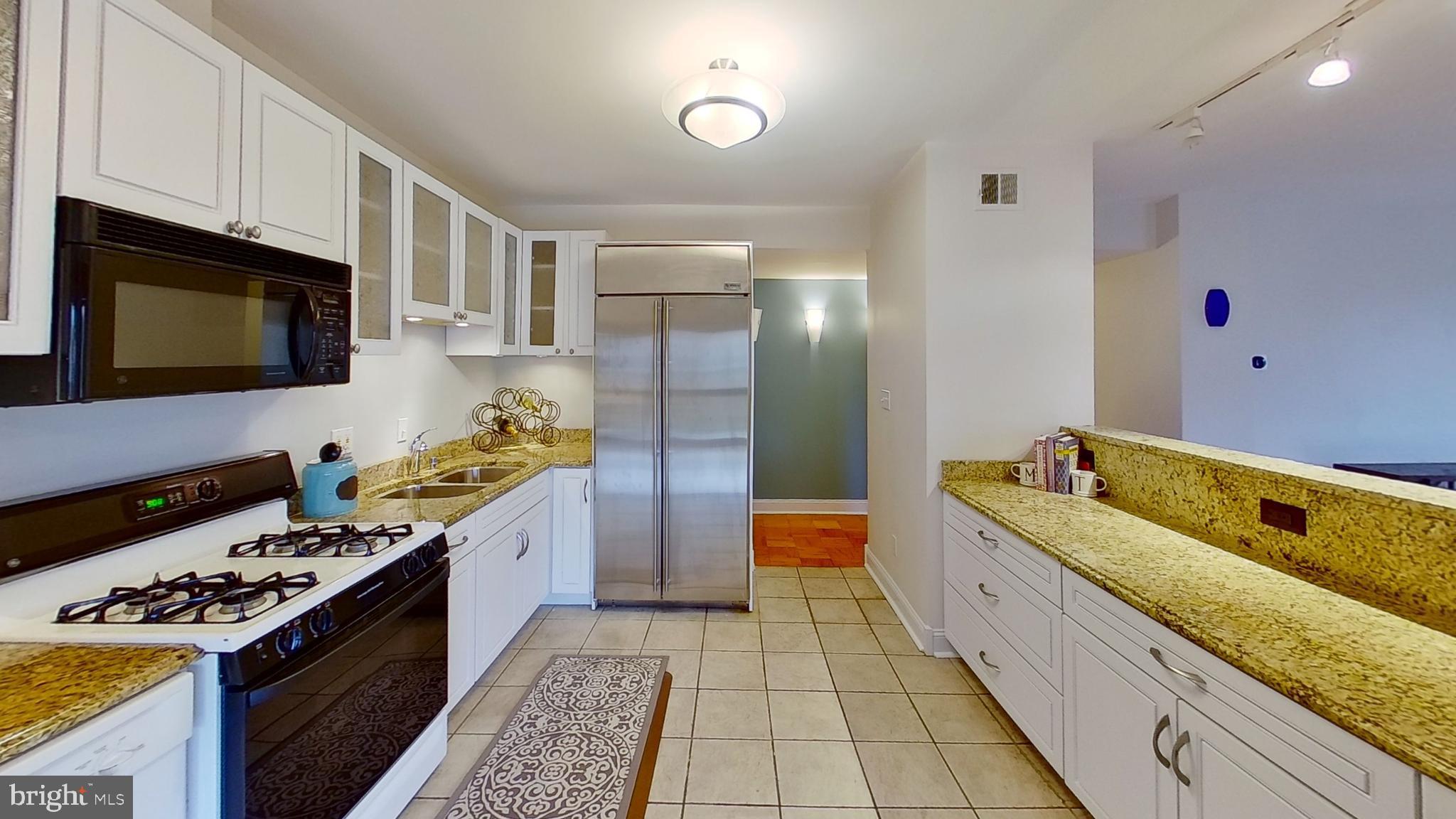7 Cross Keys Road, Unit 7E Baltimore, MD 21210 - Photo 2 of 40 Open Island Gourmet Kitchen