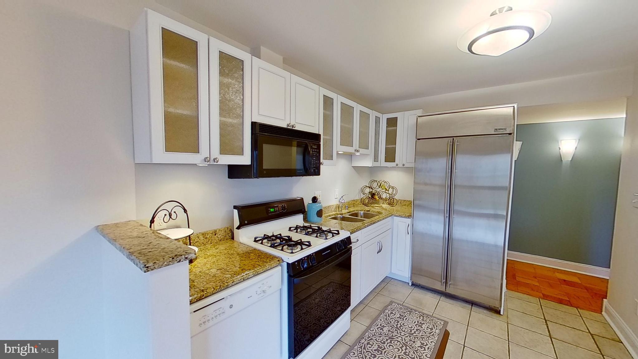 7 Cross Keys Road, Unit 7E Baltimore, MD 21210 - Photo 3 of 40 New White Cabinetry & Granite!