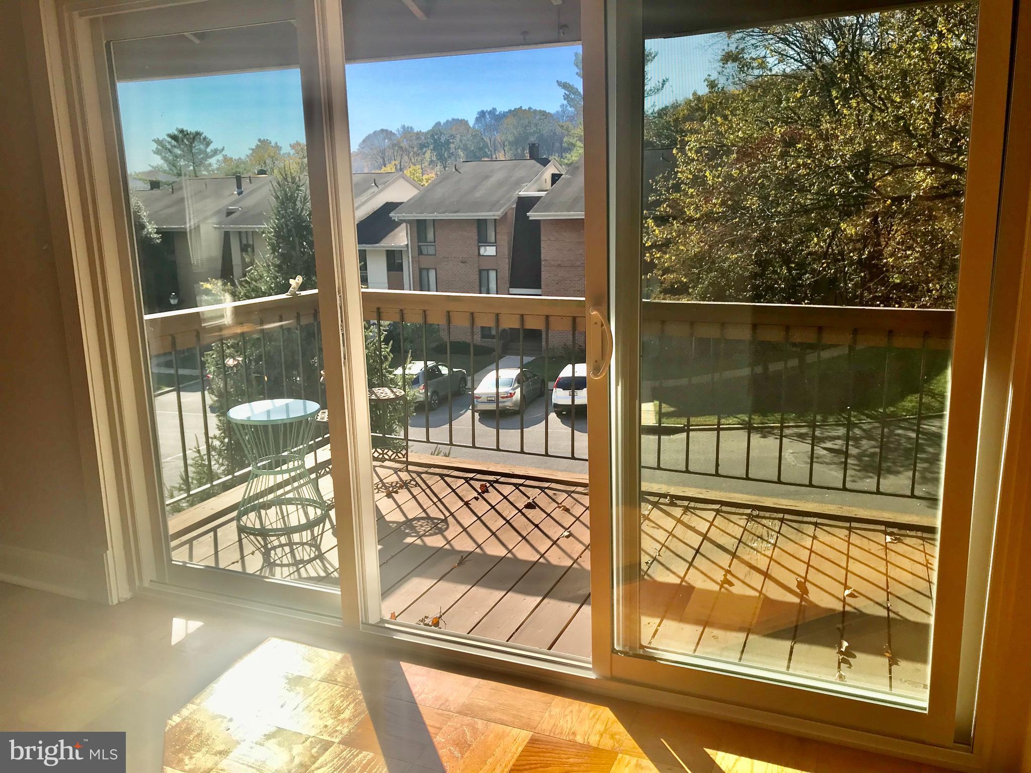 7 Cross Keys Road, Unit 7E Baltimore, MD 21210 - Photo 29 of 40 Balcony off of the Dining Area
