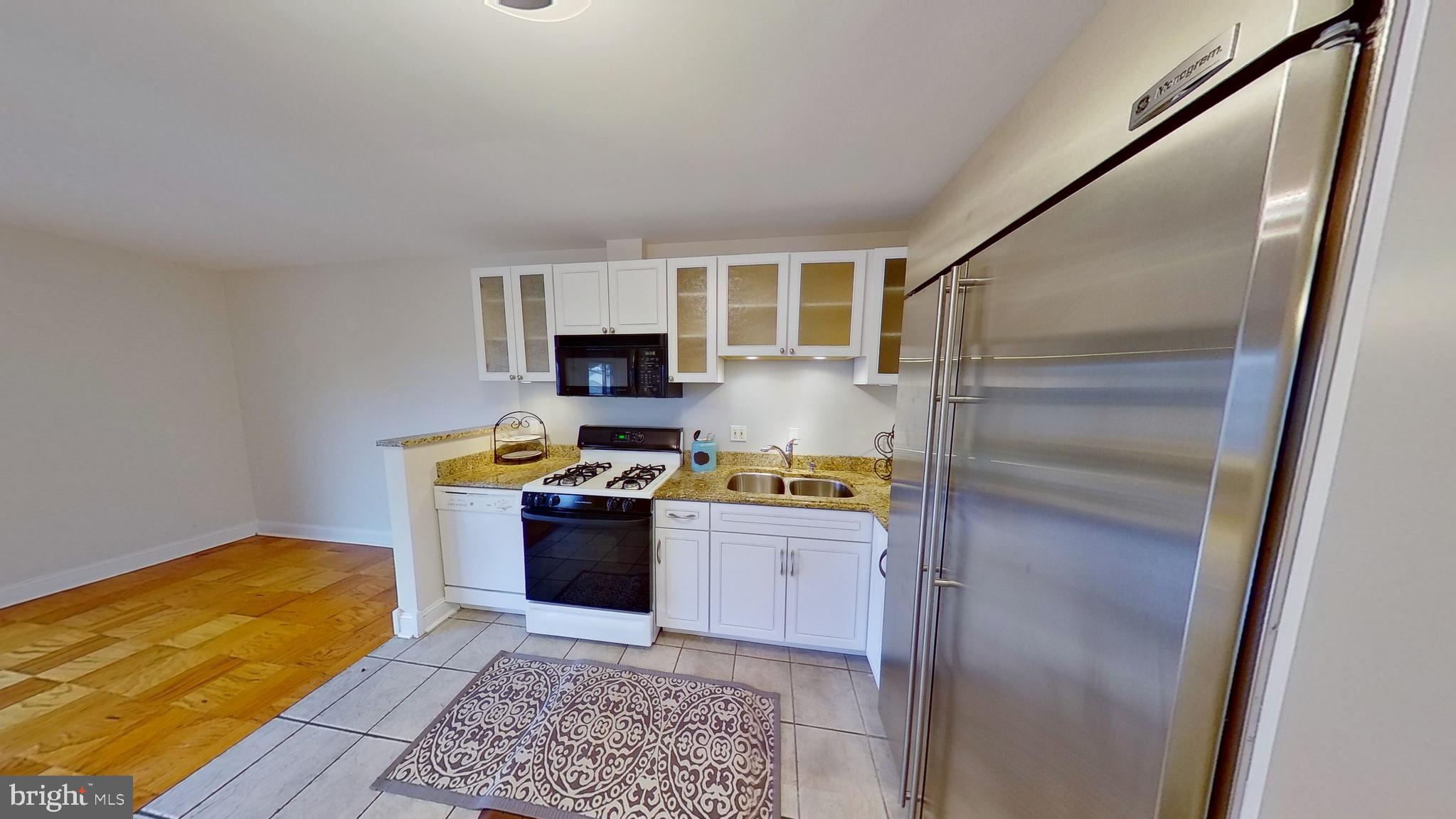 7 Cross Keys Road, Unit 7E Baltimore, MD 21210 - Photo 4 of 40 New Stainless Oversized Fridge