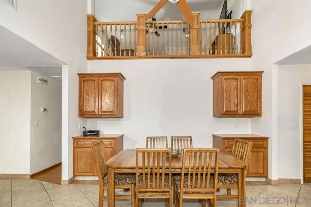 a view of a chairs and table in a kitchen