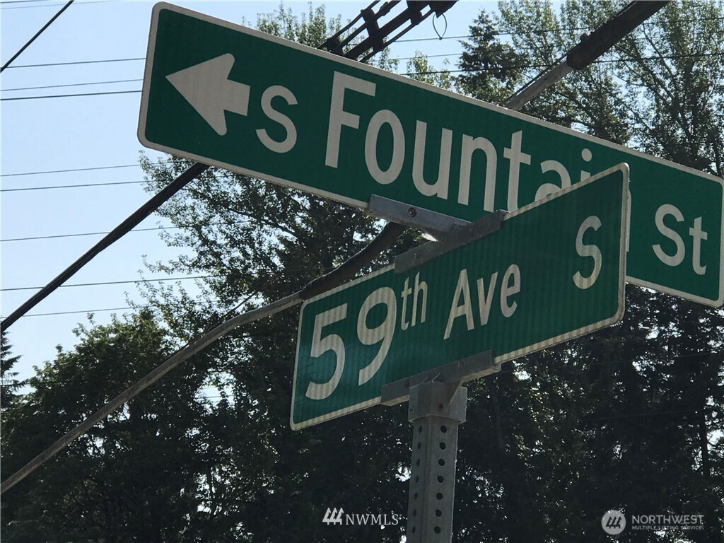 5901 South Fountain Street Seattle, WA 98178 - Photo 13 of 21 a street sign that is on a pole