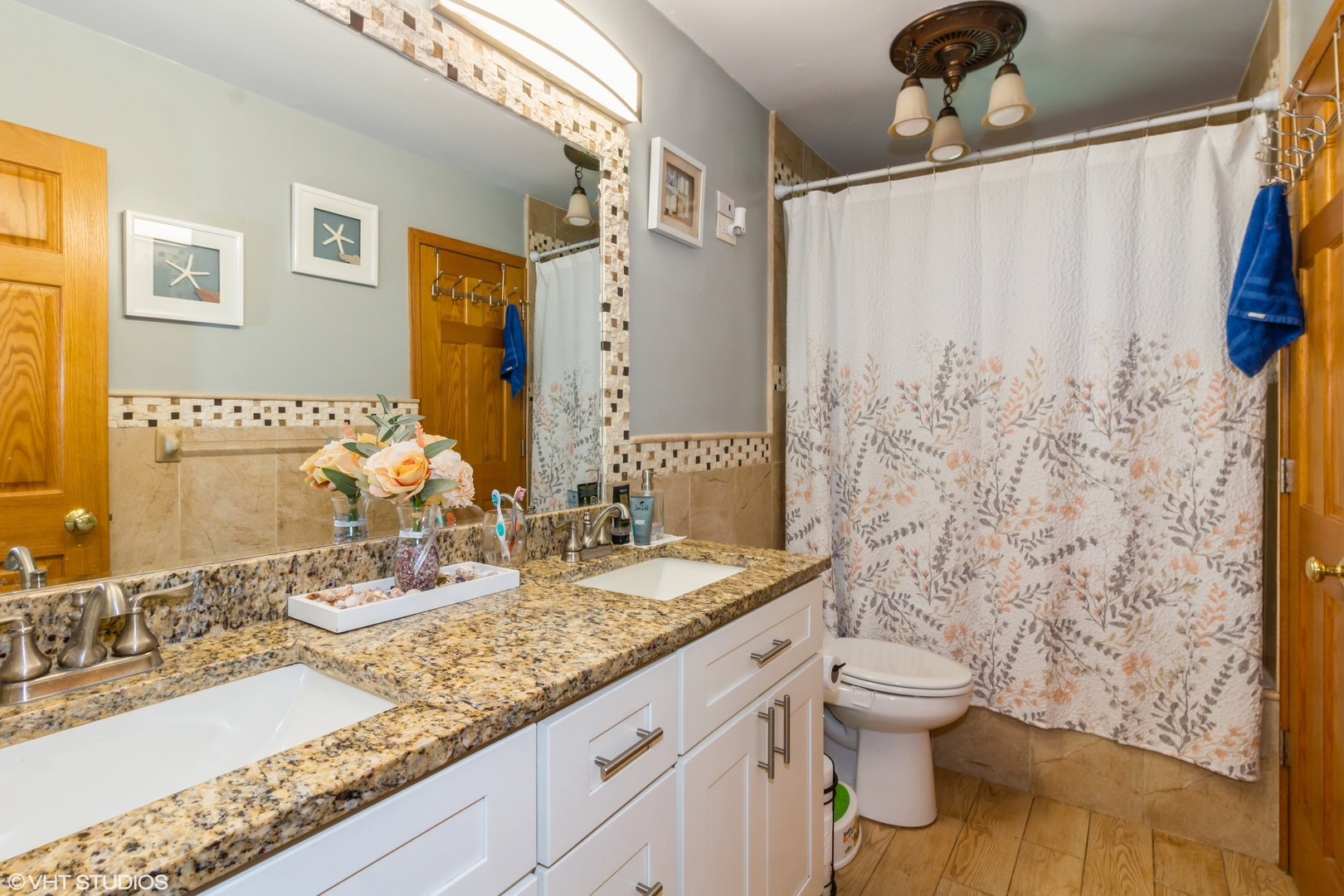 671 Rockhurst Road Bolingbrook, IL 60440 - Photo 11 of 17 a bathroom with a granite countertop sink toilet and shower