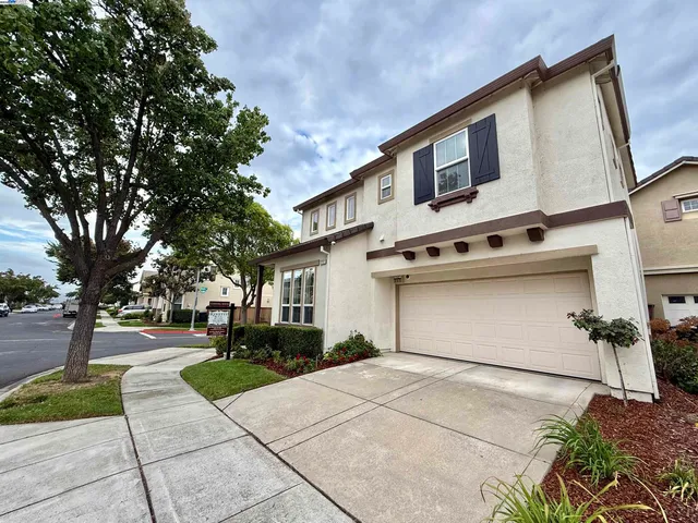 a house view with a backyard space