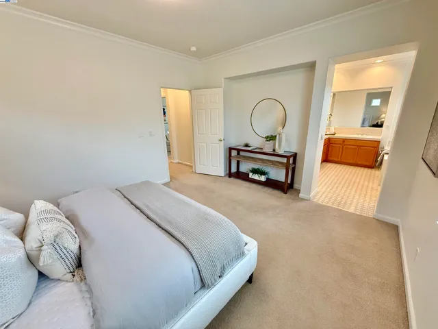 a large bathroom with a large tub shower and sink