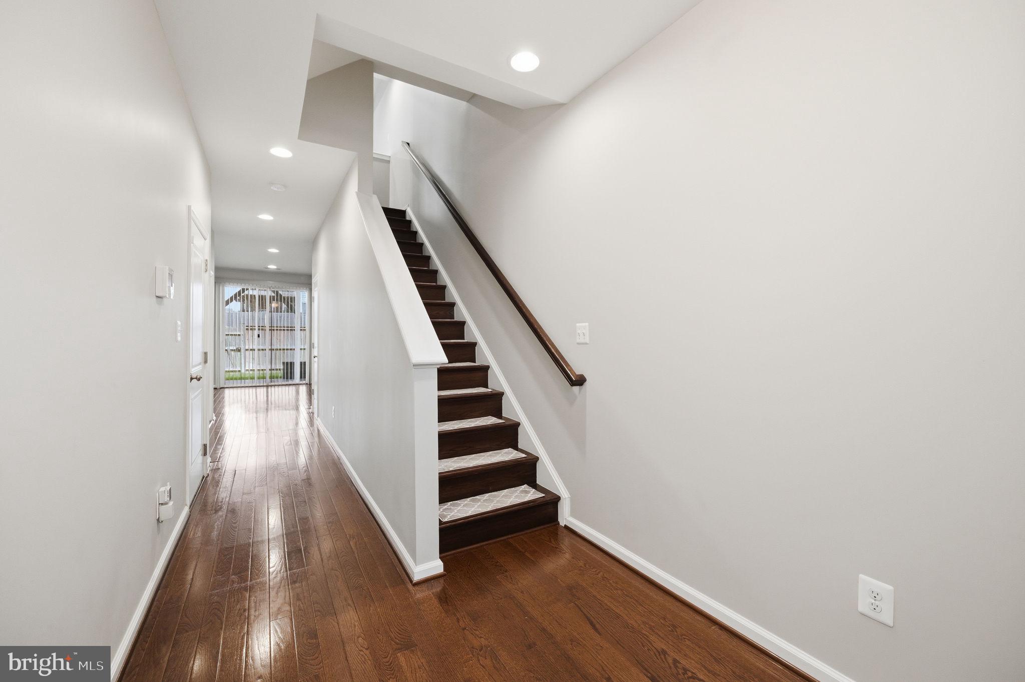 650 Aspen Road, Unit 108 Stafford, VA 22554 - Photo 8 of 26 Inviting entryway with elegant staircase.