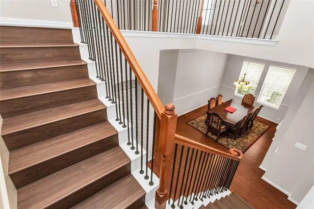 a large bathroom with a sink mirror and a bathtub