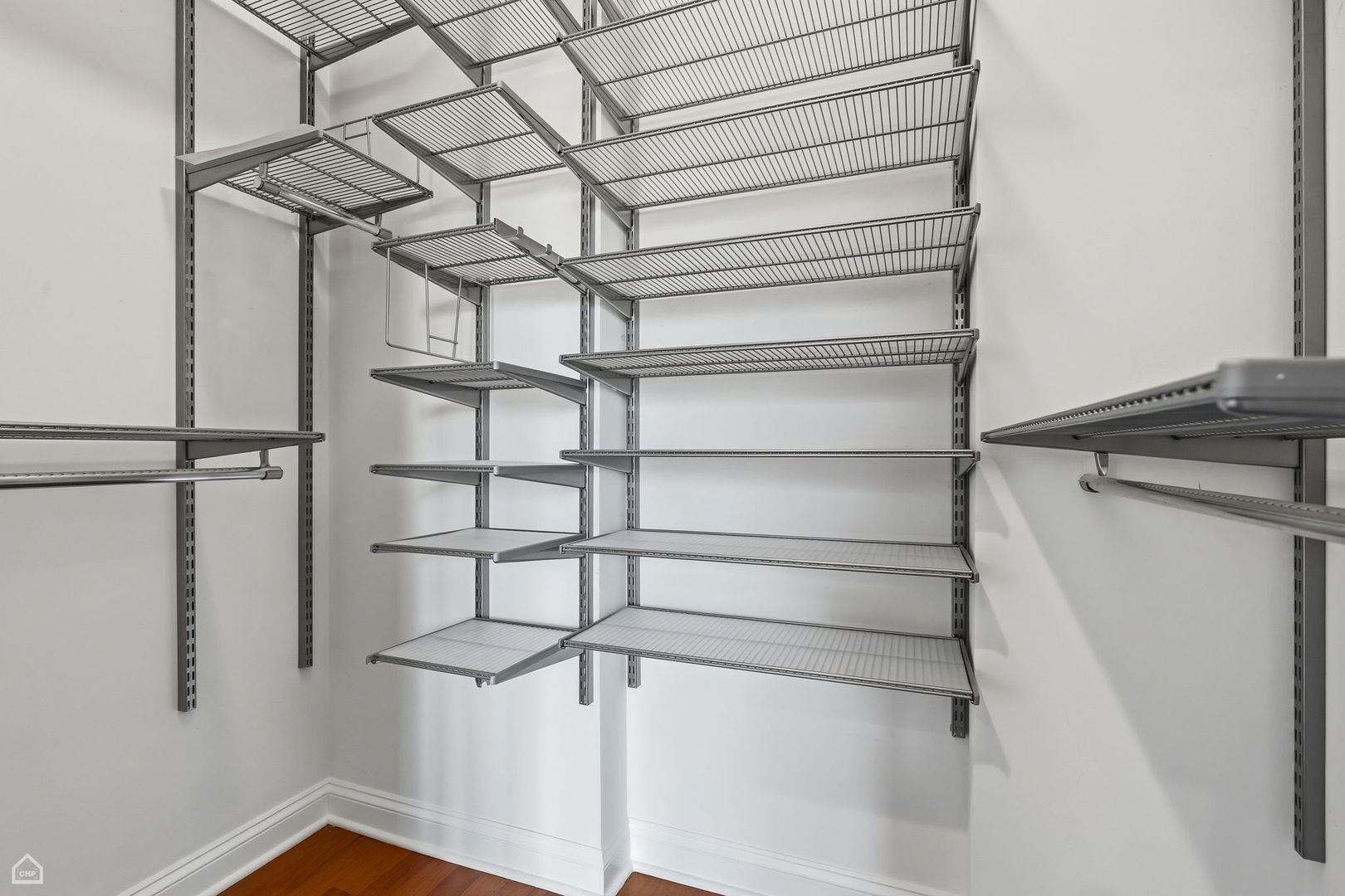 2229 North Leavitt Street, Unit 2 Chicago, IL 60647 - Photo 11 of 19 a view of a room with racks on the wall
