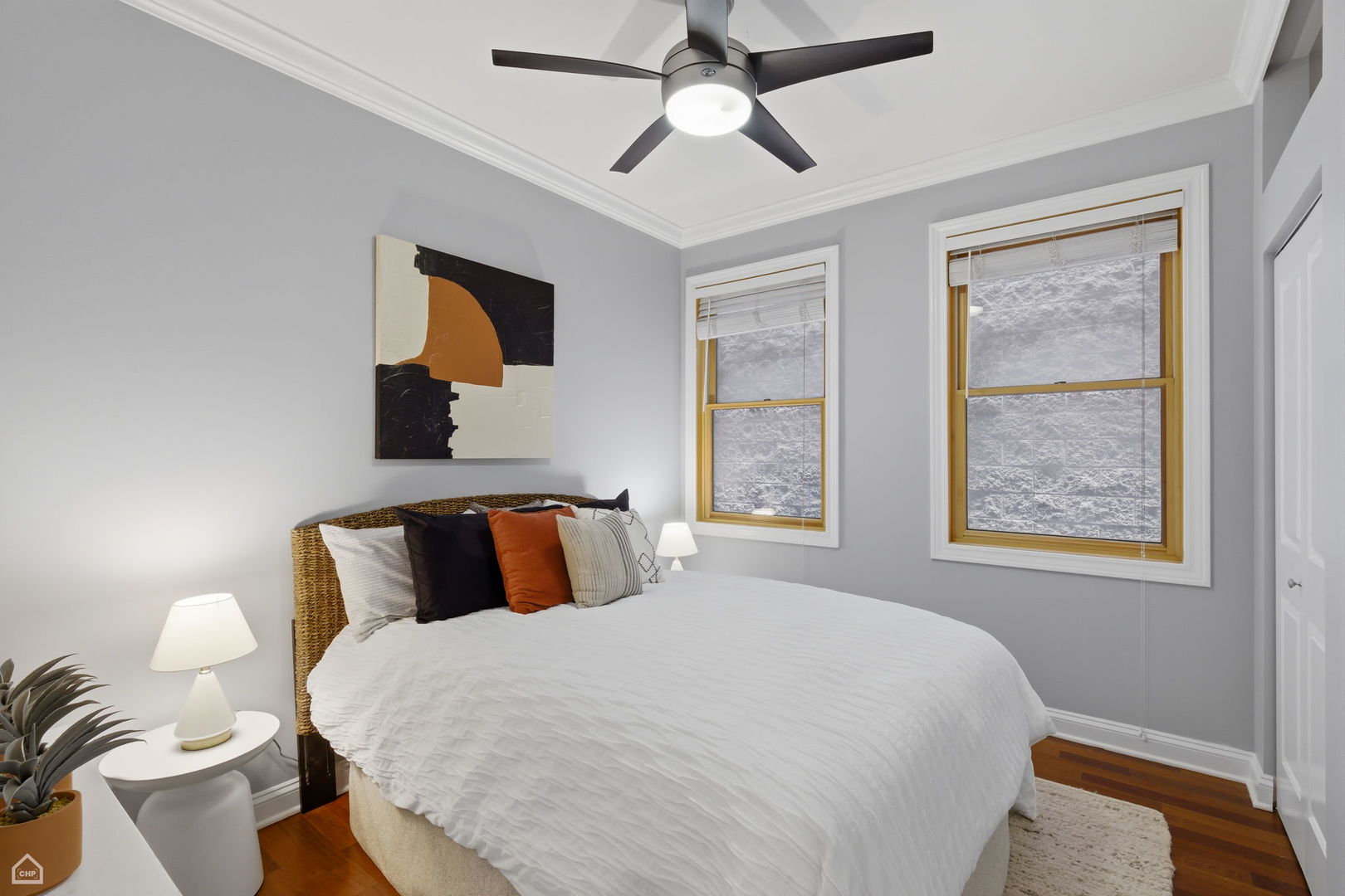2229 North Leavitt Street, Unit 2 Chicago, IL 60647 - Photo 14 of 19 a bedroom with a bed and window