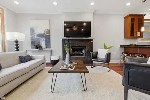 a view of a balcony with wooden floor