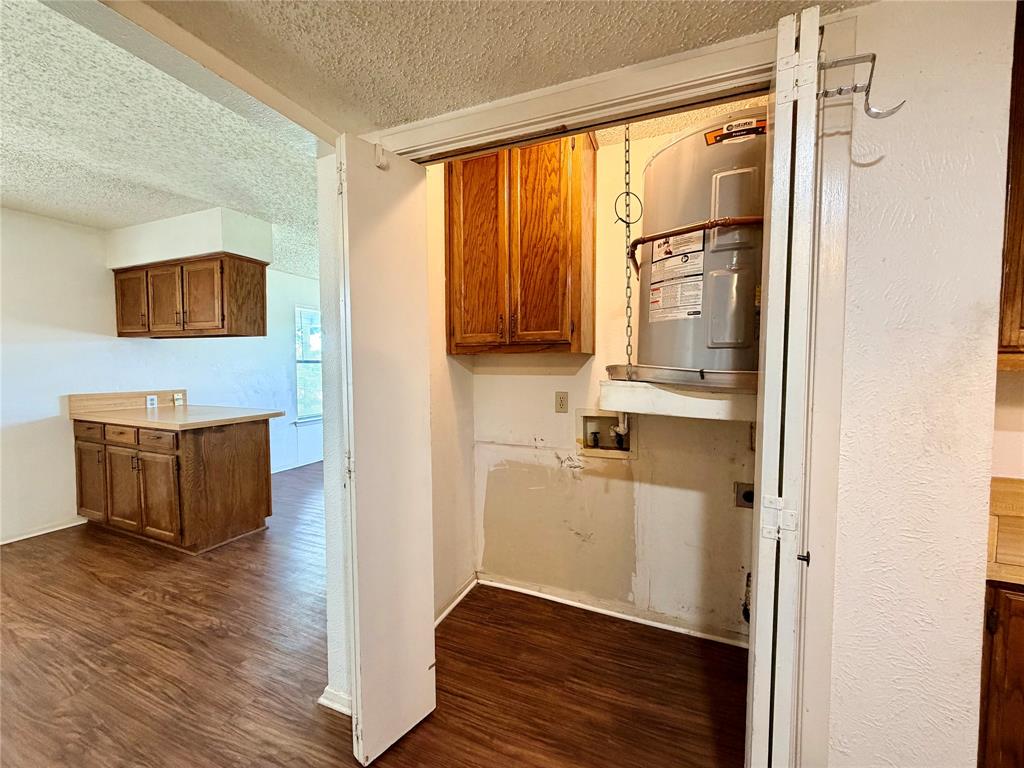 3311 Fallmeadow Street Denton, TX 76207 - Photo 8 of 13 a view of bathroom with a large window and wooden floor