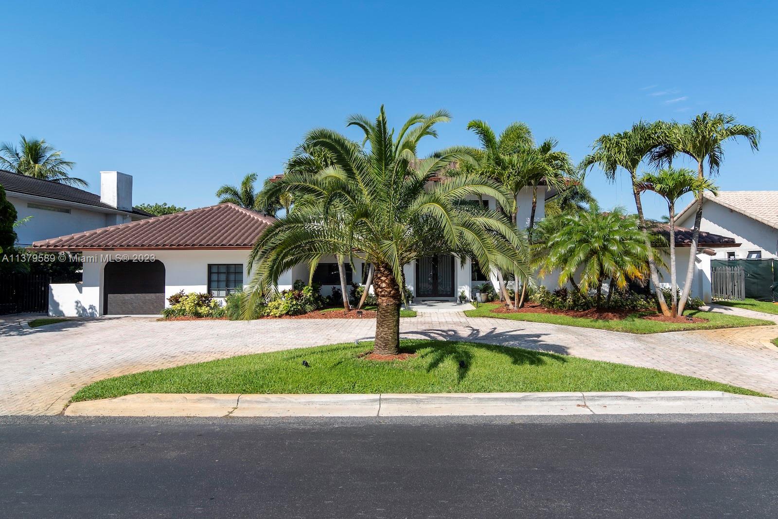 Doral Doral, FL 33178 - Photo 1 of 52 a couple of palm trees in front of house
