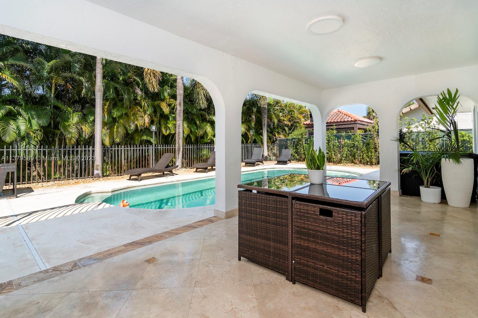 Doral Doral, FL 33178 - Photo 16 of 52 a house view with a garden space
