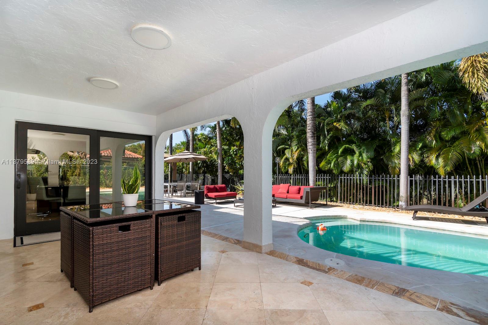 Doral Doral, FL 33178 - Photo 17 of 52 a living room with furniture and garden view