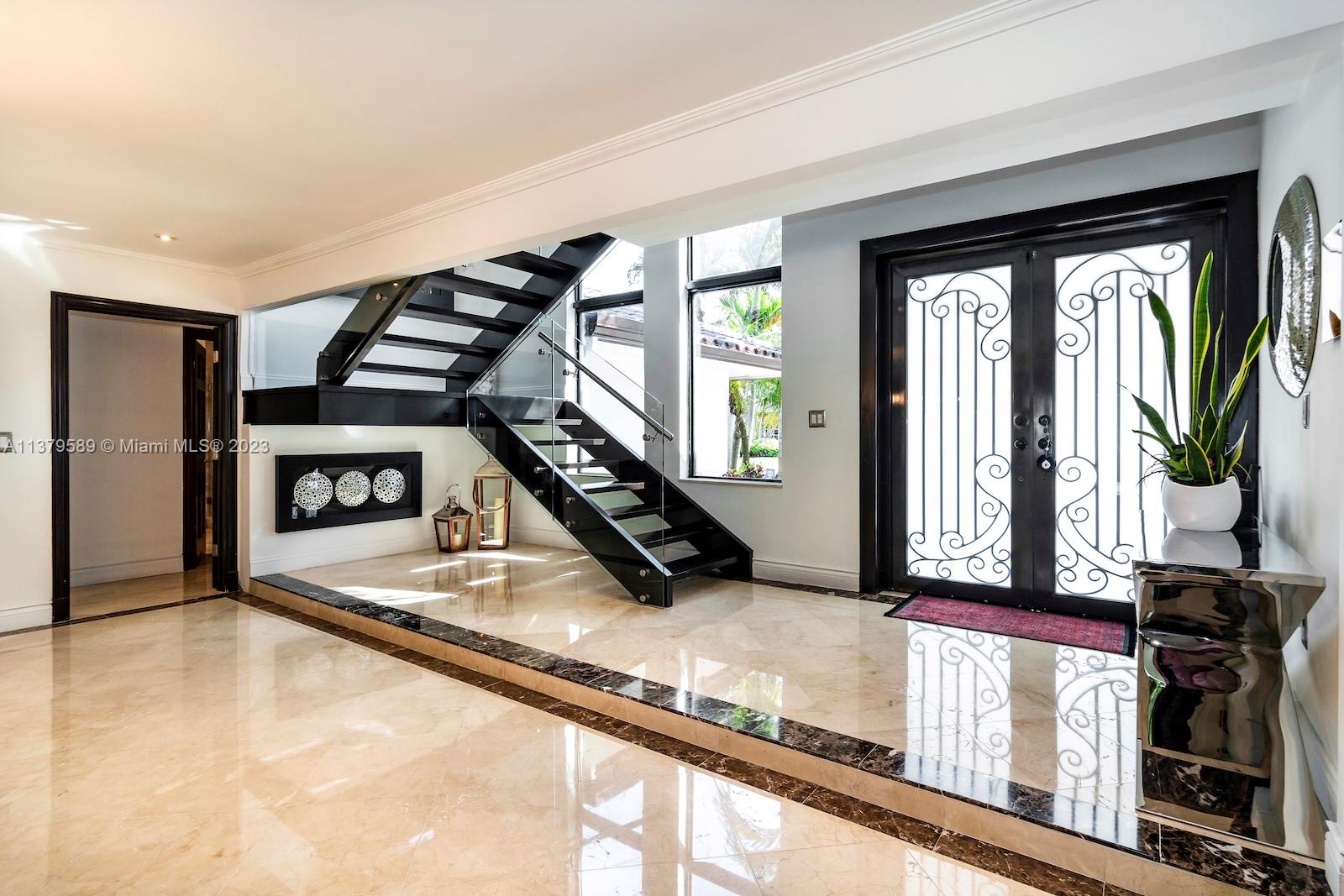 Doral Doral, FL 33178 - Photo 21 of 52 a room with gym equipment and a large window