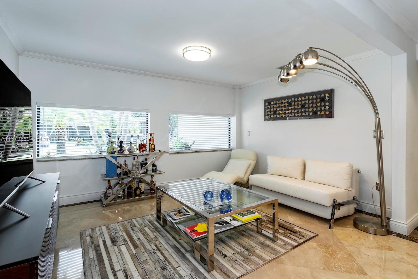 Doral Doral, FL 33178 - Photo 22 of 52 a living room with furniture and wooden floor