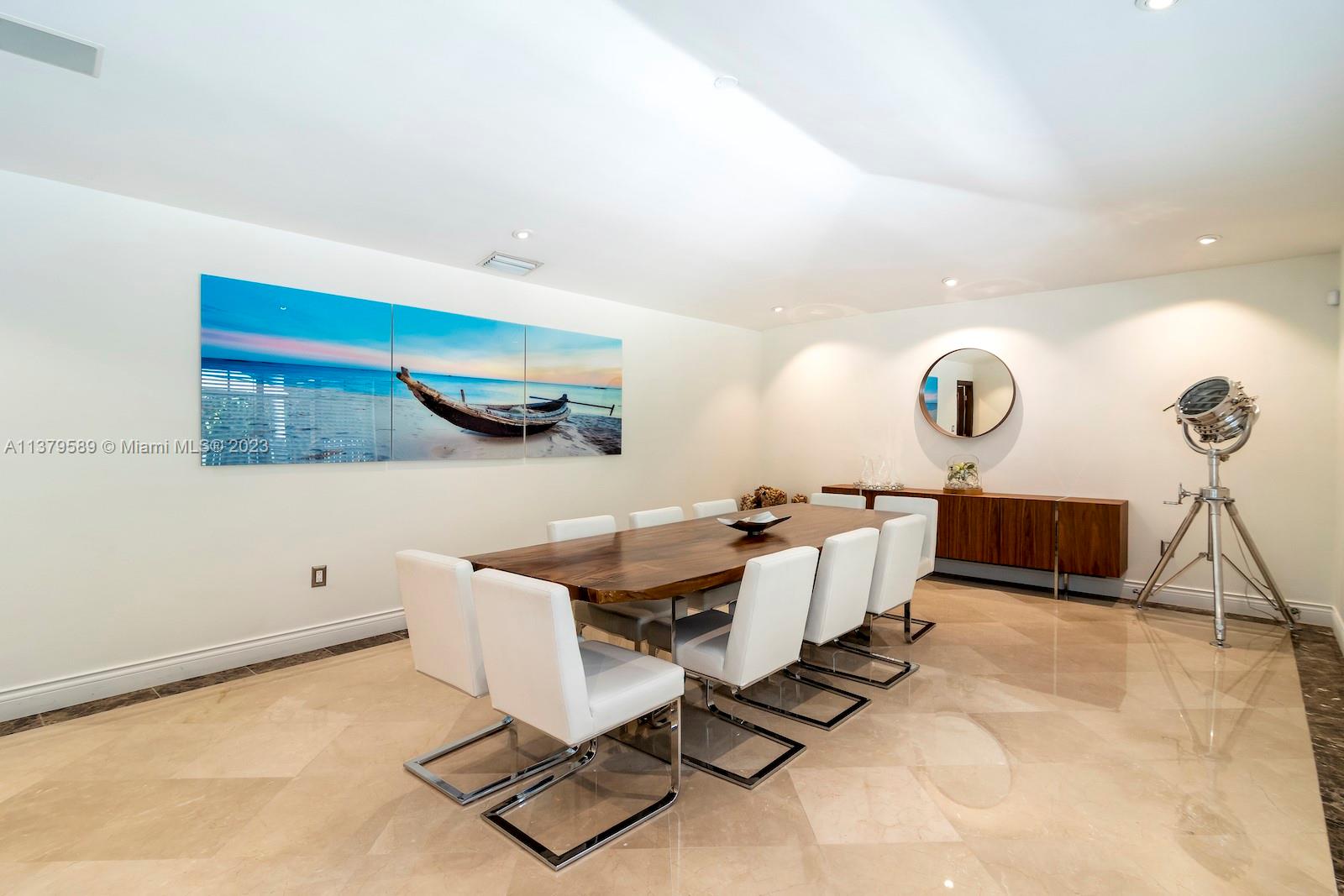 Doral Doral, FL 33178 - Photo 25 of 52 a living room with a couch and a coffee table