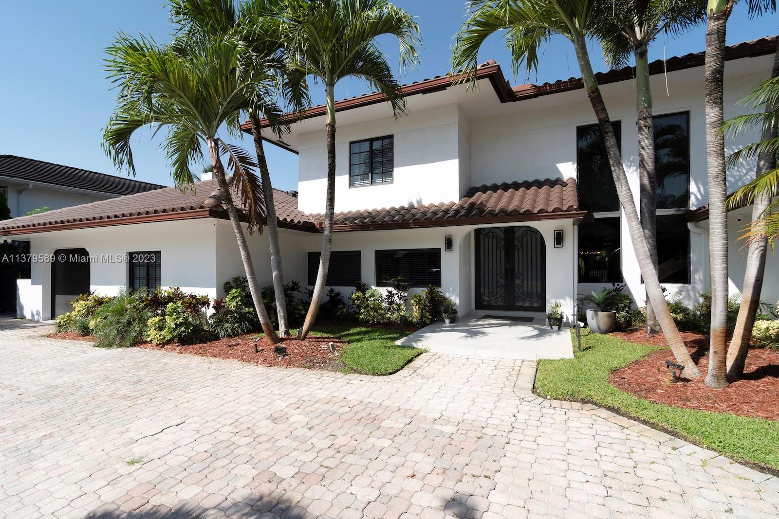 Doral Doral, FL 33178 - Photo 4 of 52 a view of a house with backyard porch and sitting area
