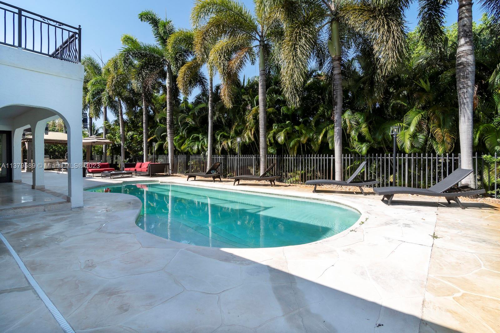 Doral Doral, FL 33178 - Photo 6 of 52 a swimming pool with outdoor seating and yard