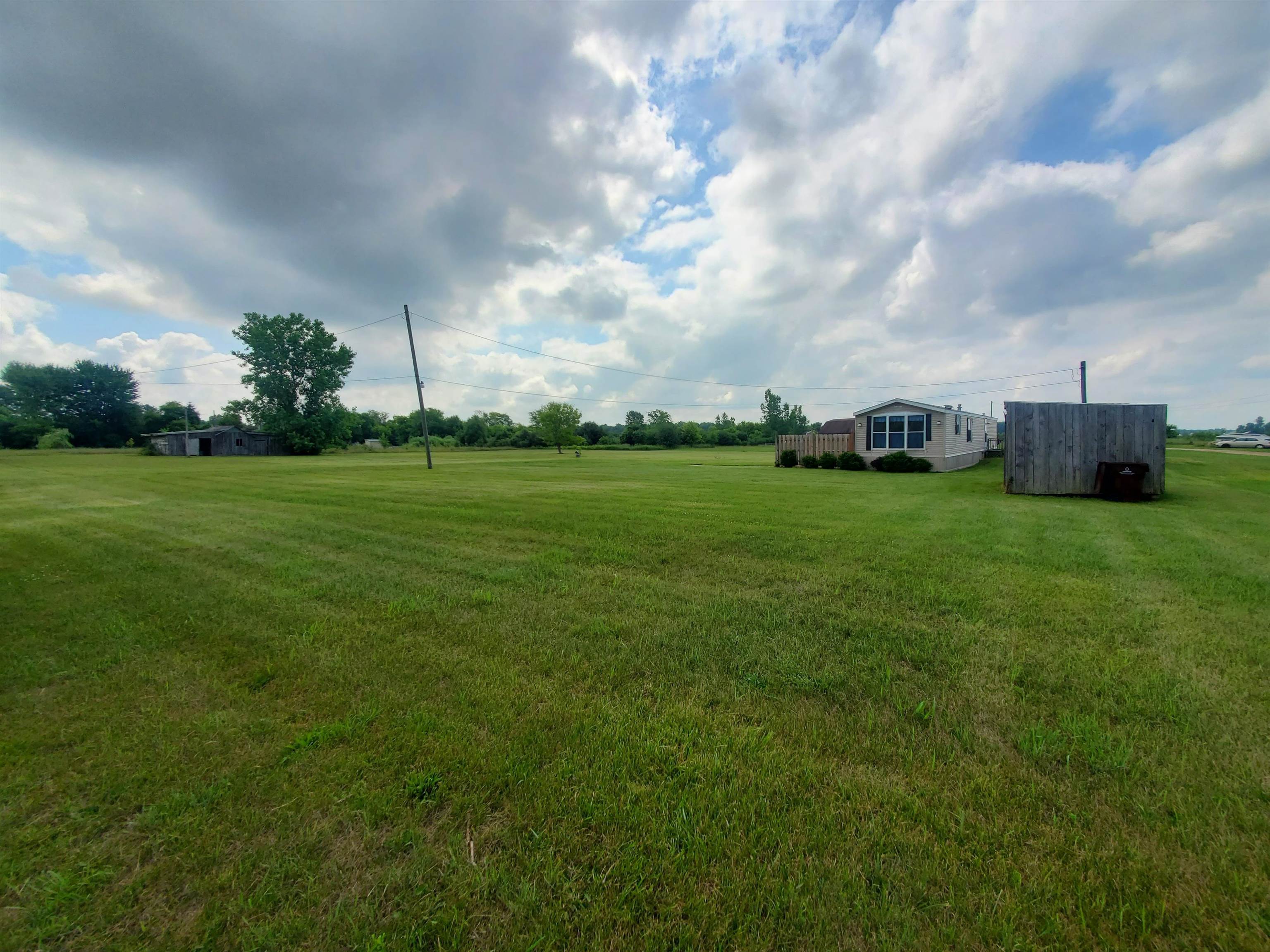 4404 East Blanchard Road Shepherd, MI 48883 - Photo 1 of 16